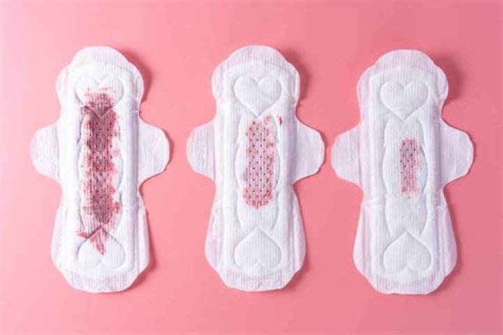 Can implantation bleeding brown stringy?