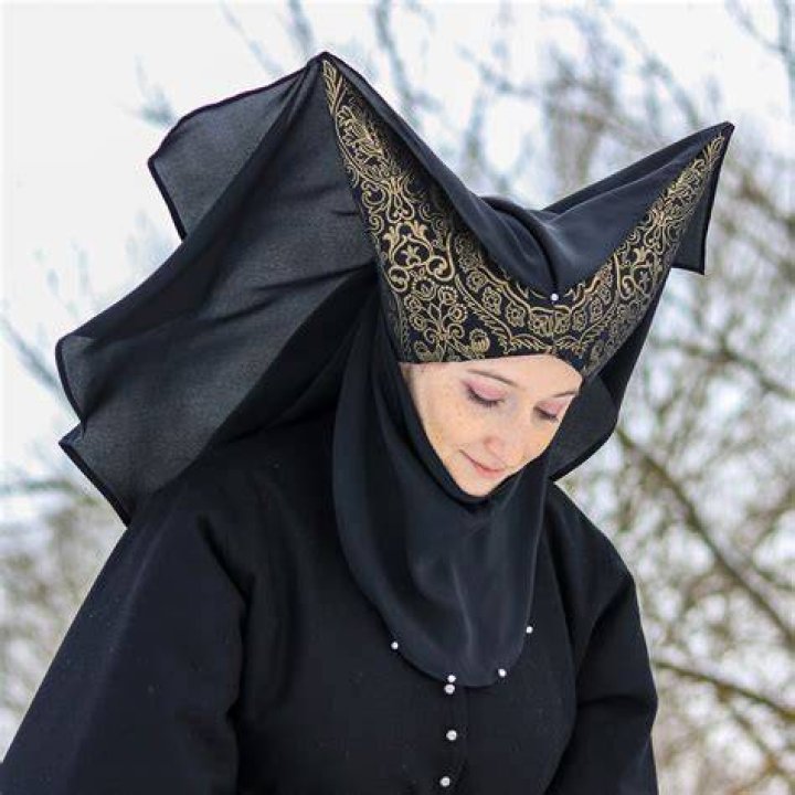 Eccentric purveyor of headwear who attends 15-Across: 2 wds.