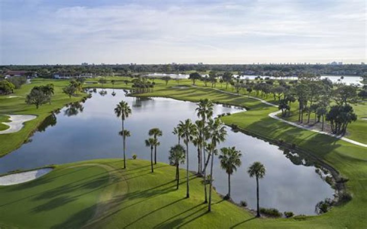 PGA National Resort and ___ (tourist destination in Florida)
