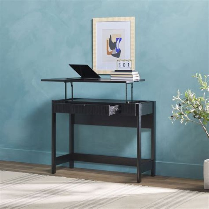 Piece of furniture that can follow writing or standing
