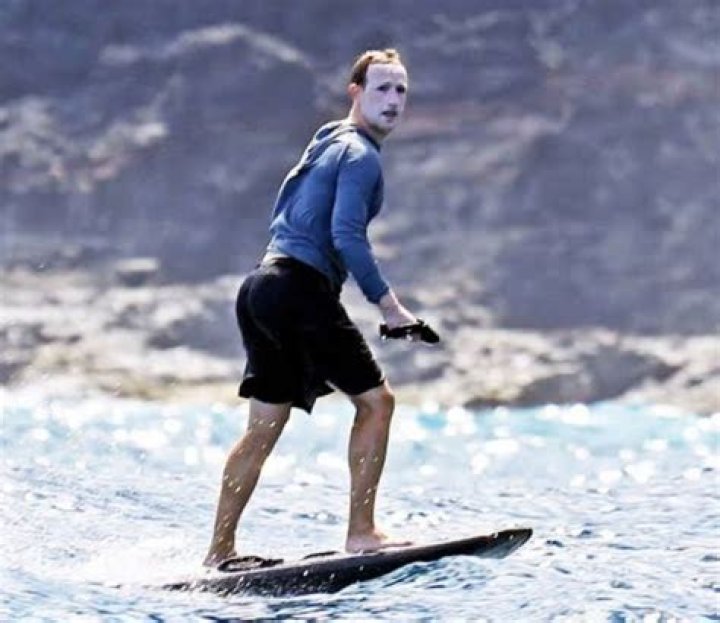 What kind of surfboard is Zuckerberg riding?